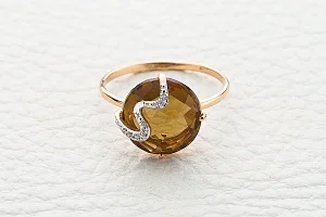 Кольцо из красного золота с султанитом и 7 фианитами