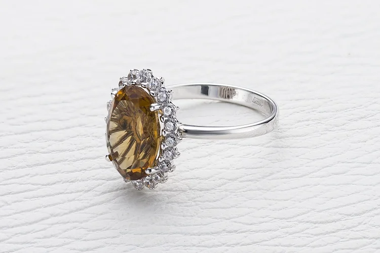 Кольцо из белого золота с султанитом и 20 фианитами