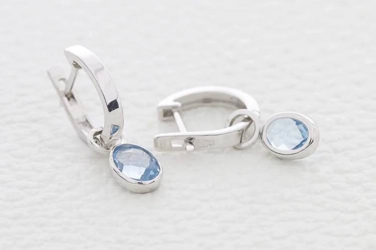 Серьги-трансформеры из белого золота с 2 топазами sky