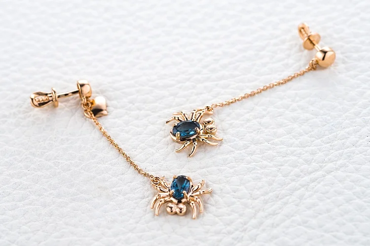 Серьги-пусеты Пауки из красного золота с 2 топазами лондон