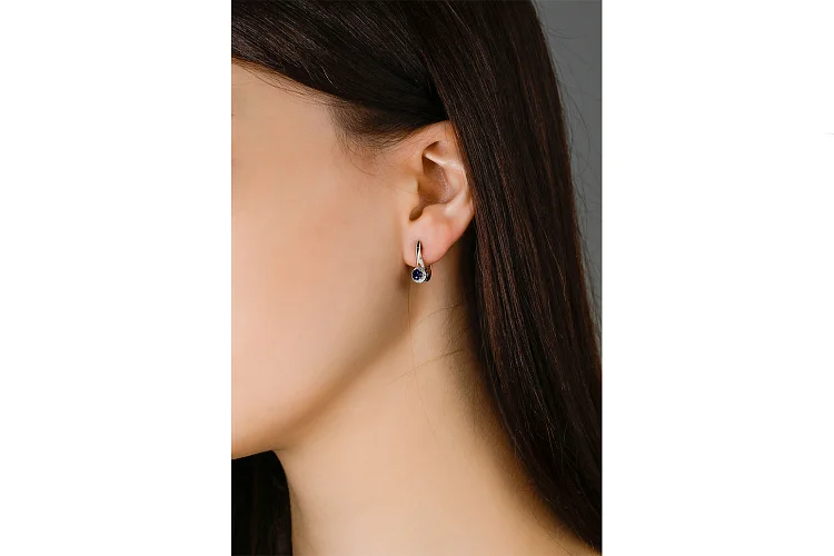 Серьги из белого золота с 2 корундами и 36 бриллиантами