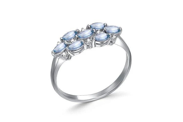 Кольцо из белого золота с 7 топазами sky и 8 бриллиантами