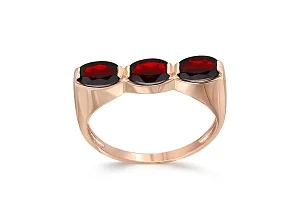 Кольцо из красного золота с 3 гранатами