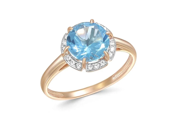 Кольцо из красного золота с топазом swiss и 18 фианитами