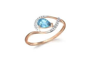 Кольцо из красного золота с топазом swiss и 7 фианитами