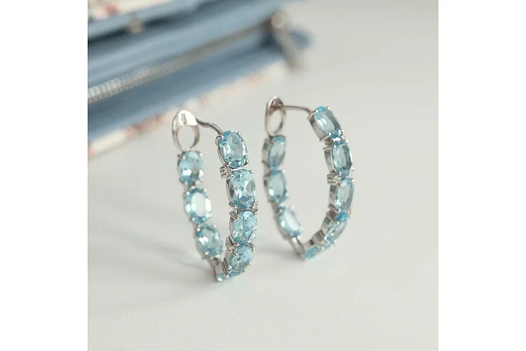 Серьги из белого золота с 16 топазами sky и 8 фианитами