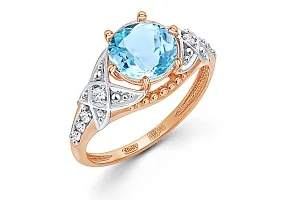 Кольцо из красного золота с топазом sky и 8 фианитами