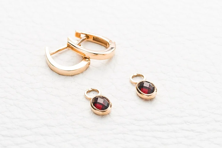 Серьги-трансформеры из красного золота с 2 гранатами