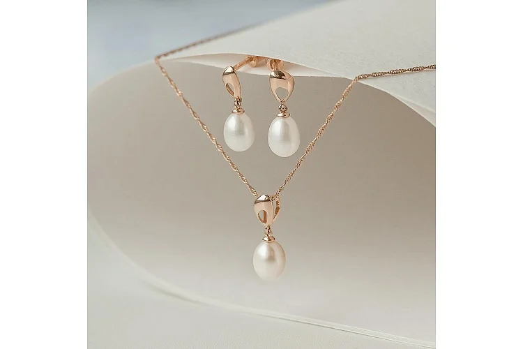 Серьги-пусеты из красного золота с 2 жемчужинами