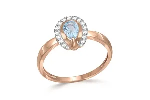 Кольцо из красного золота с топазом sky и 15 фианитами