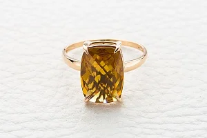 Кольцо из красного золота с султанитом