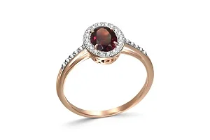 Кольцо из красного золота с гранатом и 28 фианитами