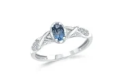 Кольцо из белого золота с топазом лондон и 20 фианитами