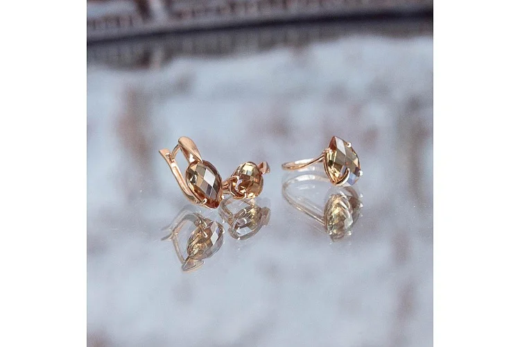 Кольцо из красного золота с султанитом