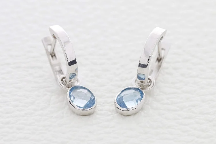 Серьги-трансформеры из белого золота с 2 топазами sky