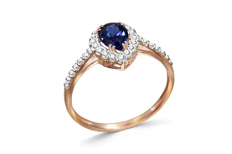 Кольцо из красного золота с корундом и 29 бриллиантами