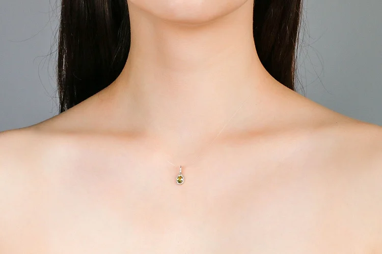 Подвеска из красного золота с хризолитом и 19 фианитами