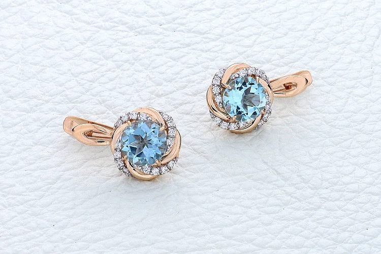 Серьги из красного золота с 2 топазами sky и 32 фианитами