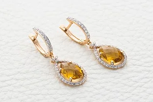 Серьги из красного золота с 2 цитринами и 78 фианитами