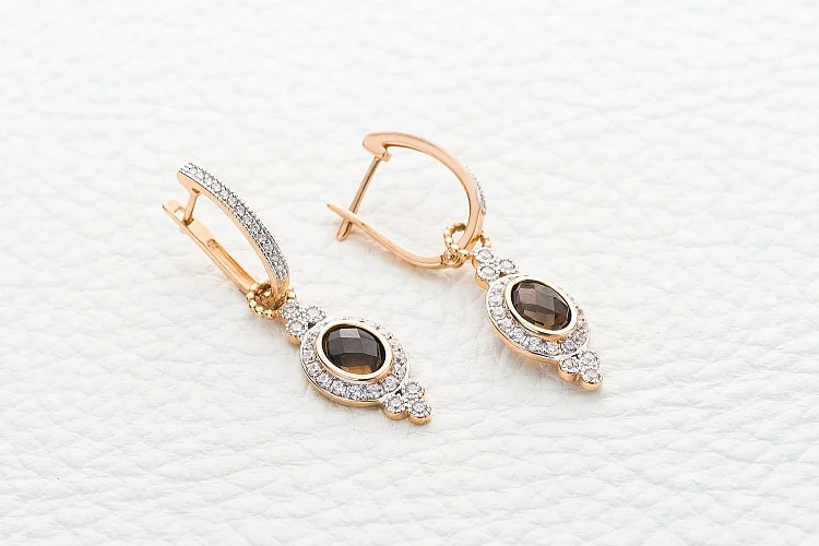 Серьги-трансформеры из красного золота с 2 раухтопазами и 70 фианитами