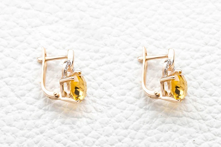 Серьги из красного золота с 18 цитринами