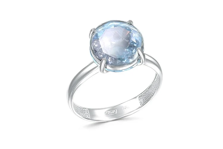 Кольцо из белого золота с 2 топазами sky и 3 бриллиантами