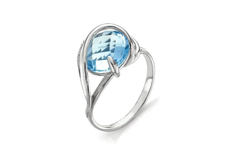 Кольцо из белого золота с топазом sky и 3 фианитами