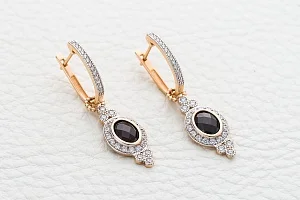 Серьги-трансформеры из красного золота с 2 гранатами и 70 фианитами