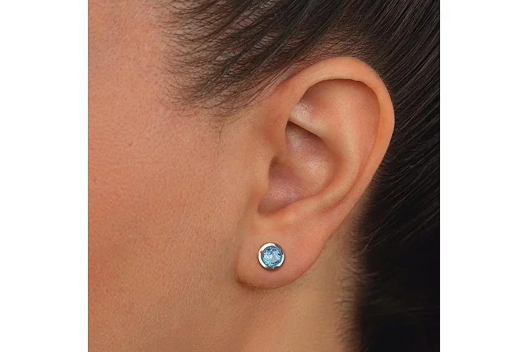 Серьги-пусеты из белого золота с 2 топазами swiss