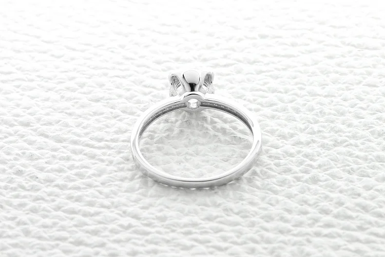 Кольцо Цветок из белого золота с сапфиром и 12 бриллиантами