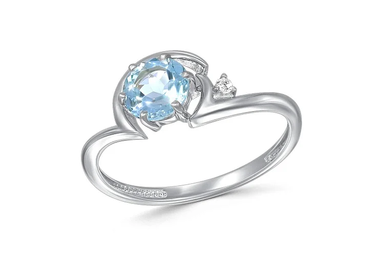 Кольцо из белого золота с топазом sky и фианитом