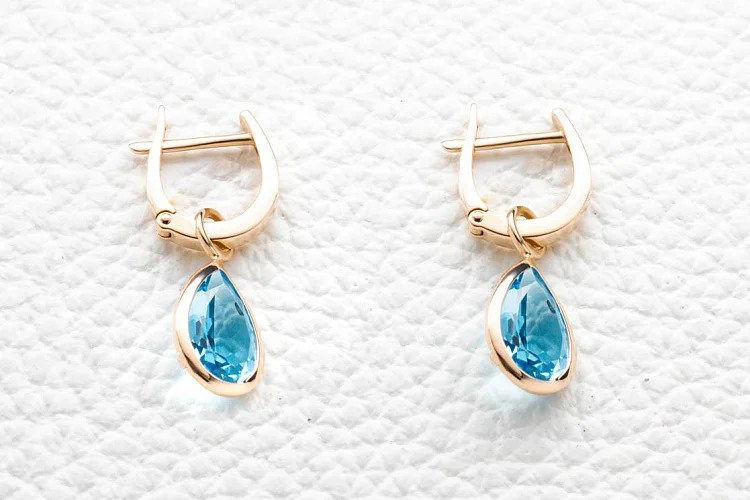 Серьги-трансформеры из красного золота с 2 топазами swiss