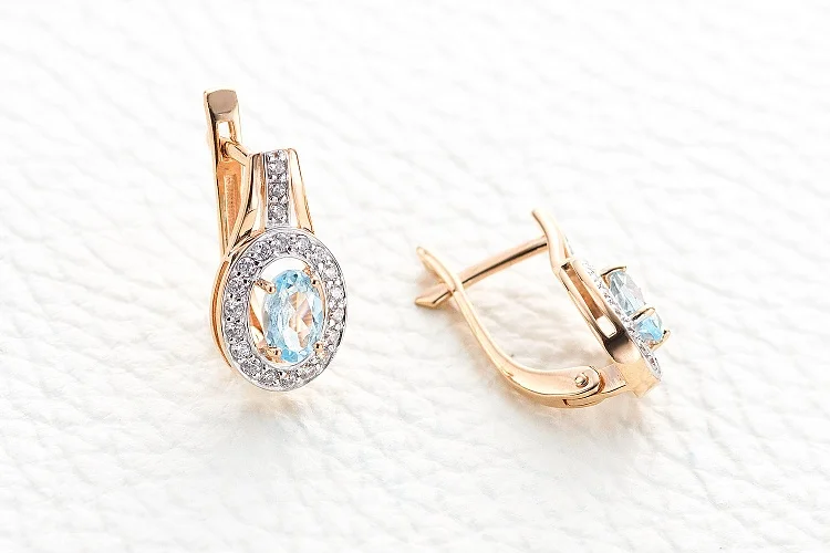 Серьги из красного золота с 2 топазами sky и 42 фианитами