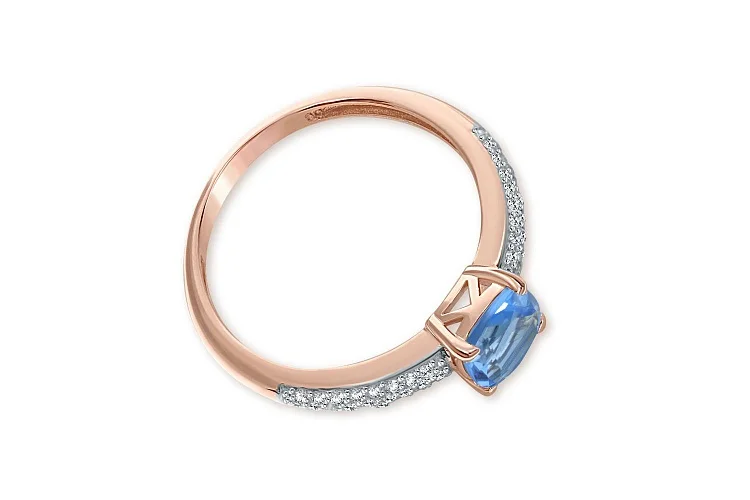 Кольцо из красного золота с топазом swiss и 50 фианитами