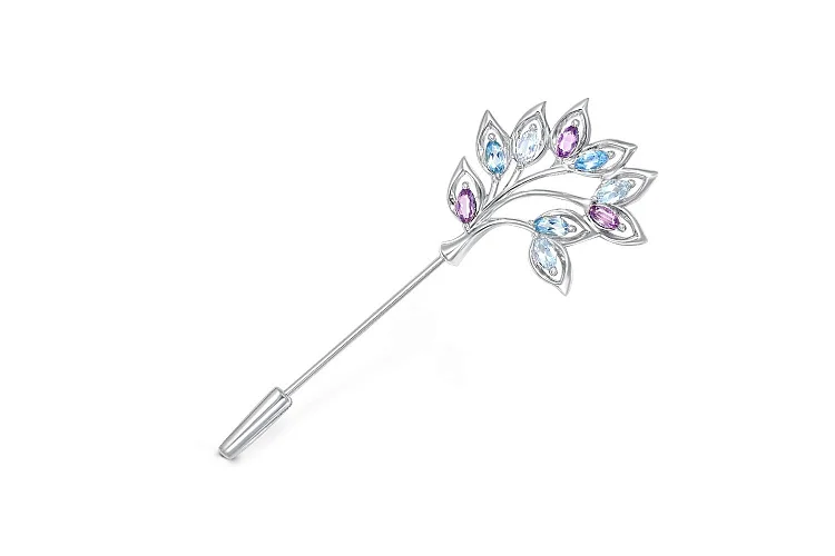 Брошь Цветок из белого золота с аметистами, топазами sky и топазами swiss
