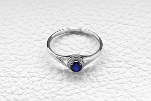 Кольцо из белого золота с корундом и 21 бриллиантами