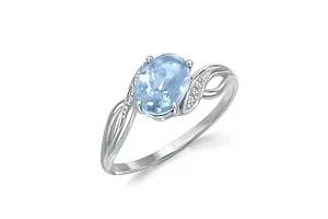 Кольцо из белого золота с топазом sky и 6 фианитами