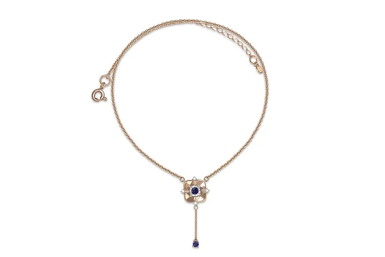 Колье из красного золота с 2 корундами и 4 бриллиантами