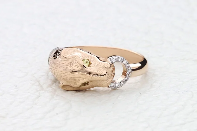 Кольцо Тигр из красного золота с 18 хризолитами