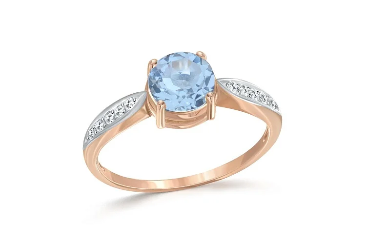 Кольцо из красного золота с топазом sky и 10 фианитами
