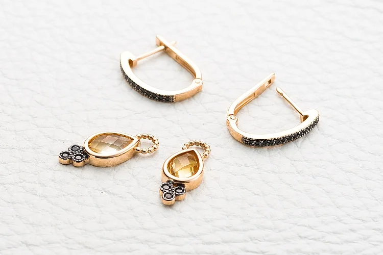 Серьги-трансформеры из красного золота с 2 цитринами и 32 фианитами