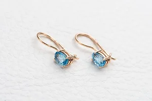 Детские серьги из красного золота с 2 топазами swiss