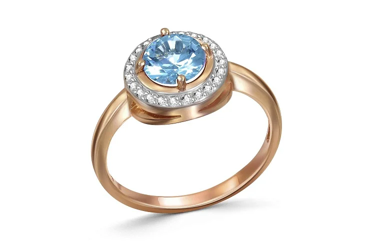 Кольцо из красного золота с топазом swiss и 23 фианитами