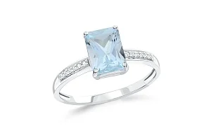 Кольцо из белого золота с топазом sky и 12 бриллиантами
