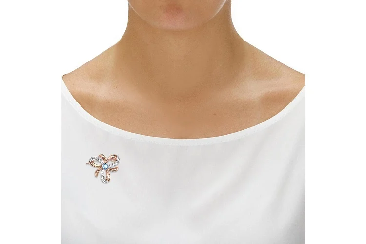 Брошь Бантик из красного золота с топазом swiss и 18 фианитами