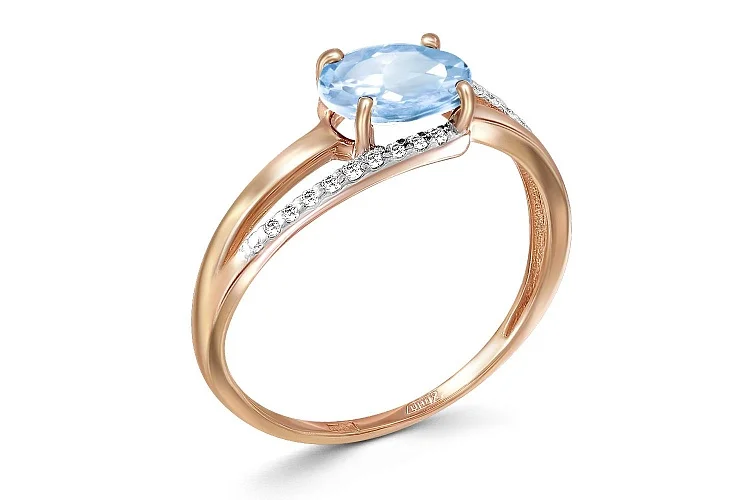 Кольцо из красного золота с топазом sky и 20 фианитами