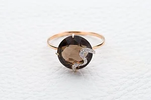 Кольцо из красного золота с раухтопазом и 7 фианитами