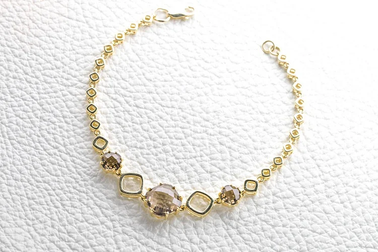 Браслет из жёлтого золота с 3 раухтопазами