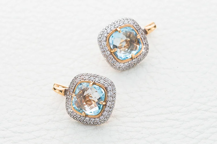 Серьги из красного золота с 2 топазами sky и 136 фианитами