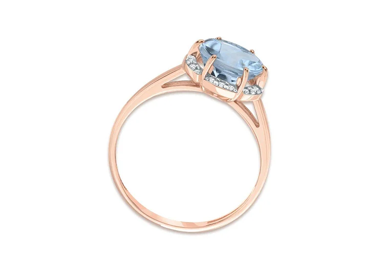 Кольцо из красного золота с топазом sky и 18 фианитами